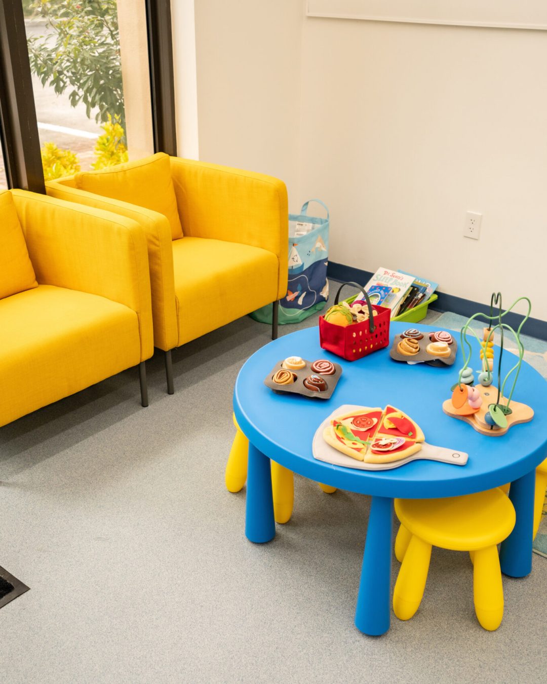 Reception room with yellow chairs